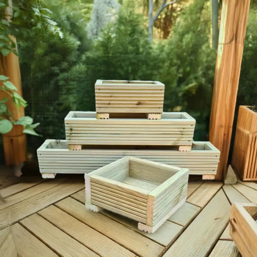 wooden garden planters with trees in the background